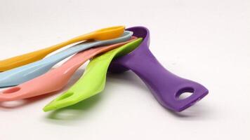 Measuring spoons in various colors photo