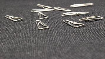 Close up of paper clips scattered photo