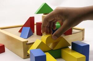 Colorful wooden puzzle toys being assembled photo