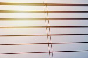 Office blinds. Modern wooden jalousie. Office meeting room lighting range control. photo