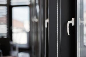 Windows row in office building. Modern windows with handles. Rows of windows in new apartment. photo