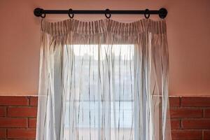Window curtains in loft apartments photo