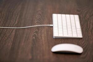 Keyboard and mouse on office table. Modern minimal workplace for study. Empty copy space. photo