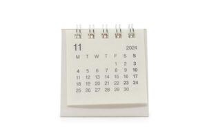 Simple desk calendar for November 2024 isolated on white background. Calendar concept with copy space. Clipping Path. photo