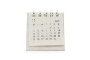 Simple desk calendar for November 2024 isolated on white background. Calendar concept with copy space. Clipping Path. photo