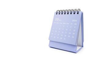 Simple desk calendar for October 2024 isolated on white background. Calendar concept with copy space. photo