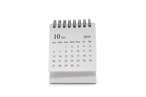 Simple desk calendar for October 2024 isolated on white background. Calendar concept with copy space. photo