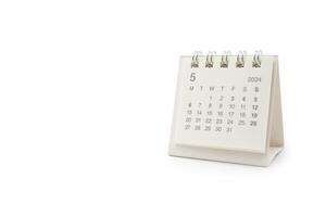 Simple desk calendar for May 2024 isolated on white background. Calendar concept with copy space. Clipping path. photo