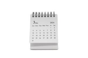 Simple desk calendar for March 2024 isolated on white background. Calendar concept with copy space. photo