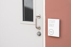 Staff Only Room. Staff only signs. staff only door signs outside. Staff only restricted area sign on the wall photo