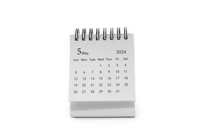 Simple desk calendar for May 2024 isolated on white background. Calendar concept with copy space. photo