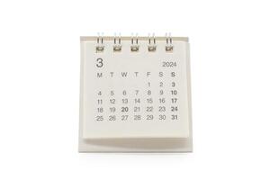 Simple desk calendar for March 2024 isolated on white background. Calendar concept with copy space. photo