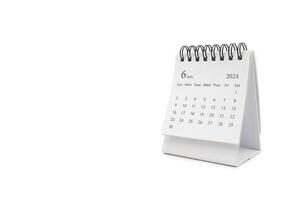 Simple desk calendar for JUNE 2024 isolated on white background. Calendar concept with copy space. photo