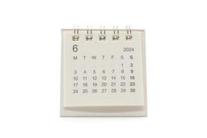 Simple desk calendar for June 2024 isolated on white background. Calendar concept with copy space. Clipping Path. photo
