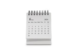 Simple desk calendar for JUNE 2024 isolated on white background. Calendar concept with copy space. photo