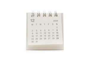 Simple desk calendar for December 2024 isolated on white background. Calendar concept with copy space. Clipping Path. photo