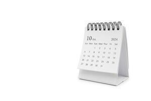 Simple desk calendar for October 2024 isolated on white background. Calendar concept with copy space. photo