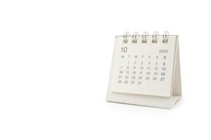 Simple desk calendar for October 2024 isolated on white background. Calendar concept with copy space. Clipping Path. photo