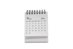 Simple desk calendar for September 2024 isolated on white background. Calendar concept with copy space. photo