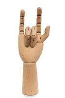 A wooden hand of mannequins make fingers love hand sign  isolated on white background with Clipping Path. photo