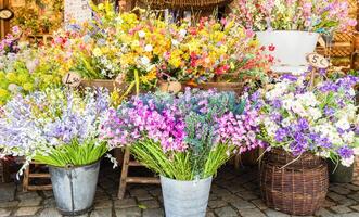 Vintage flowers market on public street - retro cottagecore style. photo