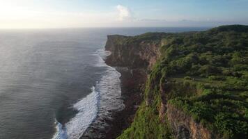Aerial Karang Boma Cliff Uluwatu Pecatu Bali during Sunset video