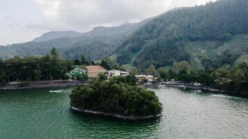 aerial view, natural tourist atmosphere of Sarangan Lake, Magetan, East Java, Indonesia. Which is a popular tourist attraction. photo