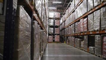 Close up of boxes on racks, goods in warehouse depot. Creative. Organized products stock in packages. photo