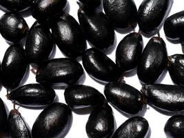 Close up black seeds of Sugar Apple. photo
