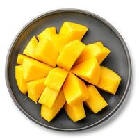 AI generated Sliced Mango on Plate - Tempting Tropical Delight Isolated on White photo