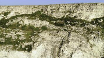 Incredible top view of the rocky terrain in summer. Shot. Beautiful view of the rocks on a Sunny day photo