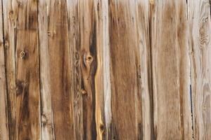 old dry weathered brownish gray wooden planks board surface - full frame background and texture photo