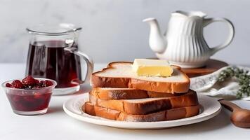 ai generado rebanado un pan con mantequilla y mermelada en un plato siguiente a un tetera y jarra, blanco fondo, neural red generado fotorrealista imagen foto