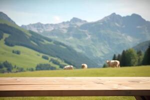 AI generated wooden table on the background of blurred alps green meadow with cows at sunny summer day, neural network generated image photo