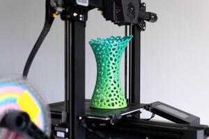 3d printing of a vase with multicolored pla filament photo