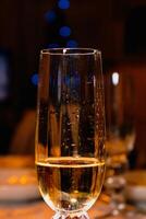 Flute glass for champagne or other sparkling wines for parties and special occasions photo