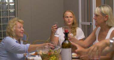 Evening meal with wine in family circle video