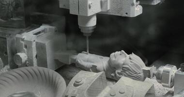 CNC milling machine creating a wooden statue video