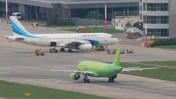 SOCHI, RUSSIA AUGUST 02, 2022 - Airplane of S7 Airlines taxiing to the runway at Sochi airport. Airliner on the airfield, rides on the taxiway. Tourism and travel concept video