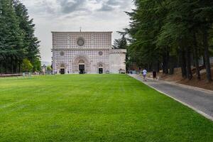 L'Aquila, Italy-august 11, 2021-View of the Basilica of Santa Maria di Collemaggio in L'Aquila during a cloudy day photo