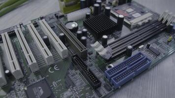Motherboard close up. Electronic circuit board with processor, close up photo