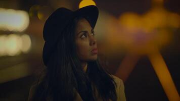 Lifestyle Portrait of Stylish Young Woman Wearing a Hat Holding Camera video