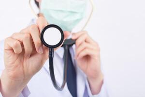 Doctor with a stethoscope in the hand prepare check patient. photo