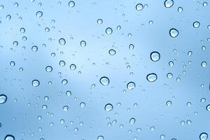 Rainy water drop on glass mirror background. photo