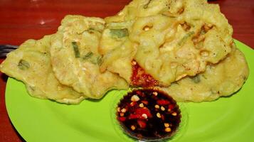 Tempe Mendoan is a traditional food made from tempeh photo