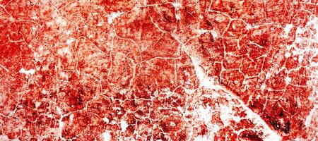 Red dirty wall grunge texture. Abstract scary concrete, Horror cement for background. old concrete wall. Grunge background for design. Distressed, blood, cracked, broken, crumbled photo