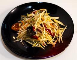 Papaya Salad With Pickled Crab On The Table photo