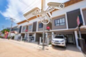 CCTV Town home camera security operating at house. photo