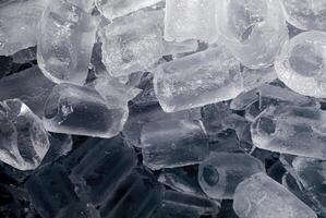 icecubes black background,icecubes black texture,icecubes black wallpaper,ice helps to feel refreshed and cool water from the icecubes helps the water refresh your life and feel good.ice cold drinks photo