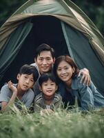 AI Generative Happy family camping in the forest taking selfie portrait together  Mother father and son having fun trekking in the nature sitting in front of the tent  Family nature and trekking photo